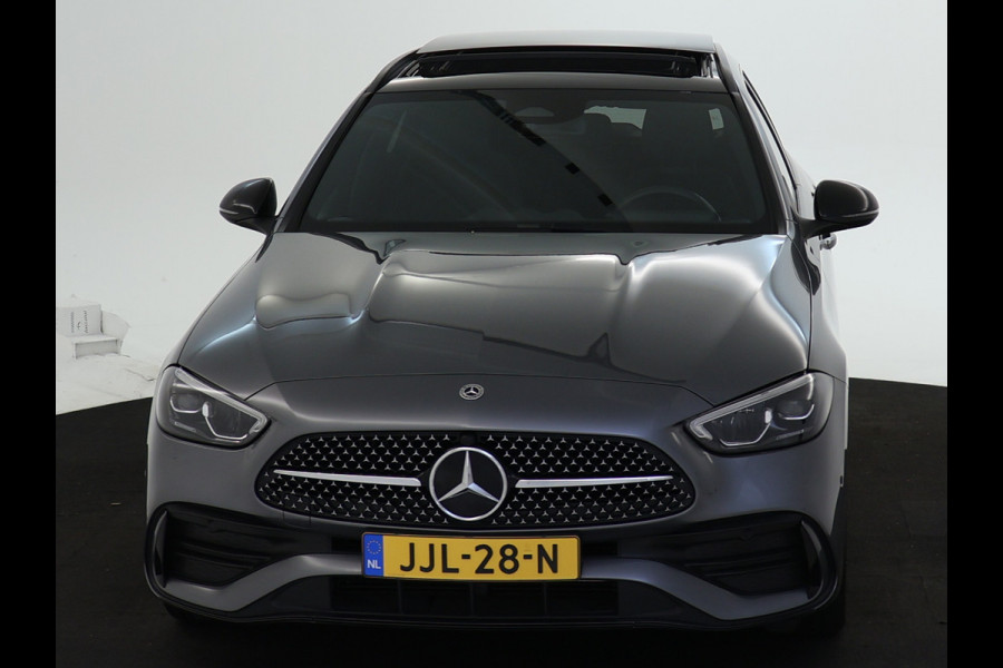 Mercedes-Benz C-Klasse Estate 300 e AMG Plug-In Hybride AMG Line | Night Pakket | Trekhaak | Panorama Schuif-Kanteldak | Memory Voorstoelen. Inclusief 24 maanden Mercedes-Benz Certified garantie voor Europa. Mercedes-Benz C-Klasse Estate 300 e AMG Plug-In Hybride AMG Line | Night Pakket | Trekhaak | Panorama Schuif-Kanteldak | Memory Voorstoelen. Inclusief 24 maanden Mercedes-Benz Certified garantie voor Europa.