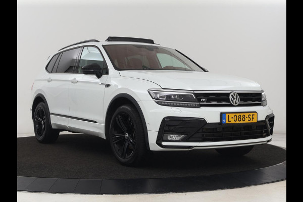Volkswagen Tiguan Allspace 1.5 TSI R Line 7-Persoons | Panoramadak | Stoelverwarming | Trekhaak | Massage | Keyless | 19'' | Camera | Carplay | Adaptive cruise | Full LED | Navigatie Volkswagen Tiguan Allspace 1.5 TSI R Line 7-Persoons | Panoramadak | Stoelverwarming | Trekhaak | Massage | Keyless | 19'' | Camera | Carplay | Adaptive cruise | Full LED | Navigatie