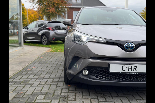 Toyota C-HR 1.8 Hybrid Executive | Stoelverwarming, Navigatie, Keyless, Leer/Stof, 18 Inch Toyota C-HR 1.8 Hybrid Executive | Stoelverwarming, Navigatie, Keyless, Leer/Stof, 18 Inch