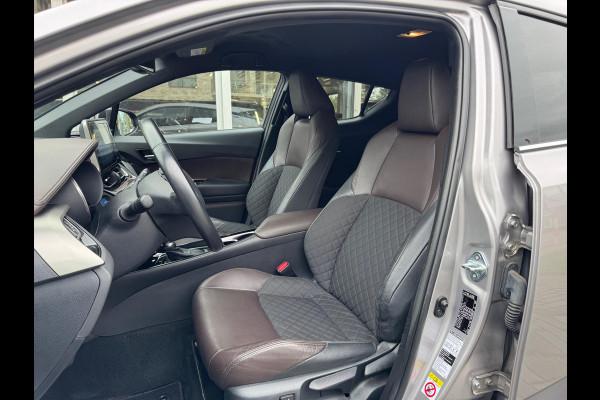 Toyota C-HR 1.8 Hybrid Executive | Stoelverwarming, Navigatie, Keyless, Leer/Stof, 18 Inch Toyota C-HR 1.8 Hybrid Executive | Stoelverwarming, Navigatie, Keyless, Leer/Stof, 18 Inch