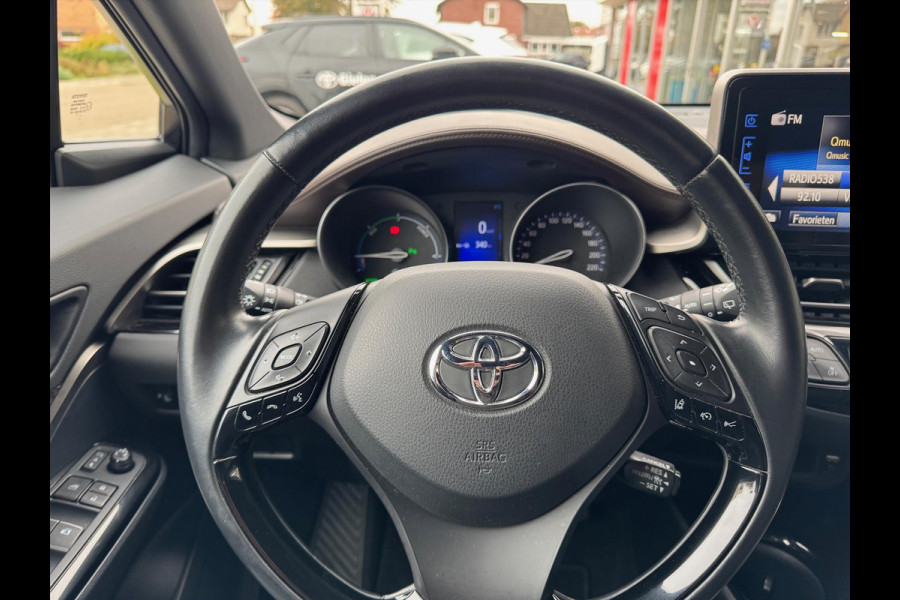 Toyota C-HR 1.8 Hybrid Executive | Stoelverwarming, Navigatie, Keyless, Leer/Stof, 18 Inch Toyota C-HR 1.8 Hybrid Executive | Stoelverwarming, Navigatie, Keyless, Leer/Stof, 18 Inch