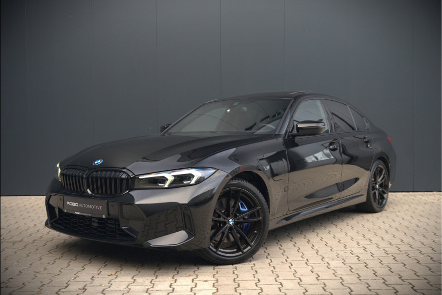BMW 3-serie 320e High Executive M Sport | Panoramadak | Harman Kardon | Carbon | Camera | Adaptive LED | Stoelverwarming | Stuurverwarming | Apple Carplay | Navigatie | Cruise Control | Memory Seat | Trekhaak | Keyless | Shadowline