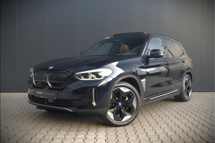 BMW iX3 High Executive 80 kWh | Panoramadak | Keyless | Stoelverwarming | Harman Kardon | Memory Seat | Head-Up Display | 360 Camera | Adaptief Onderstel | Trekhaak | Adaptive LED | Elektrische Stoelen | Apple Carplay | N BMW iX3 High Executive 80 kWh | Panoramadak | Keyless | Stoelverwarming | Harman Kardon | Memory Seat | Head-Up Display | 360 Camera | Adaptief Onderstel | Trekhaak | Adaptive LED | Elektrische Stoelen | Apple Carplay | N