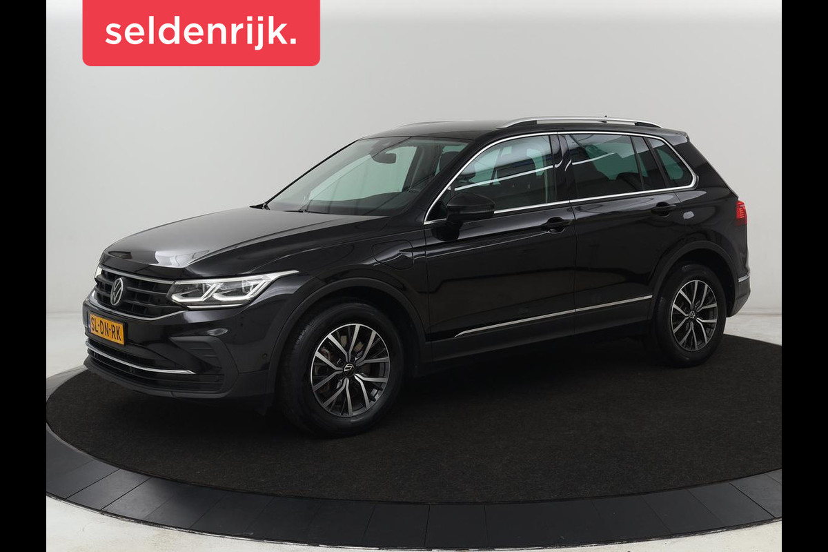 Volkswagen Tiguan 1.4 TSI eHybrid Style | Stoelverwarming | Camera | Adaptive cruise | Carplay | Sfeerverlichting | Full LED | Navigatie | Park Assist | DAB | Stuurverwarming | PHEV | Plug In Volkswagen Tiguan 1.4 TSI eHybrid Style | Stoelverwarming | Camera | Adaptive cruise | Carplay | Sfeerverlichting | Full LED | Navigatie | Park Assist | DAB | Stuurverwarming | PHEV | Plug In