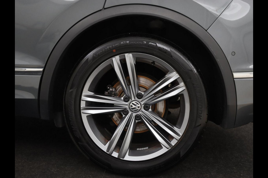 Volkswagen Tiguan 1.5 TSI R Line | Panoramadak | Trekhaak | Stoelverwarming | Camera | Adaptive cruise | Virtual Cockpit | 19'' | Carplay | Park Assist | Navigatie | Full LED Volkswagen Tiguan 1.5 TSI R Line | Panoramadak | Trekhaak | Stoelverwarming | Camera | Adaptive cruise | Virtual Cockpit | 19'' | Carplay | Park Assist | Navigatie | Full LED