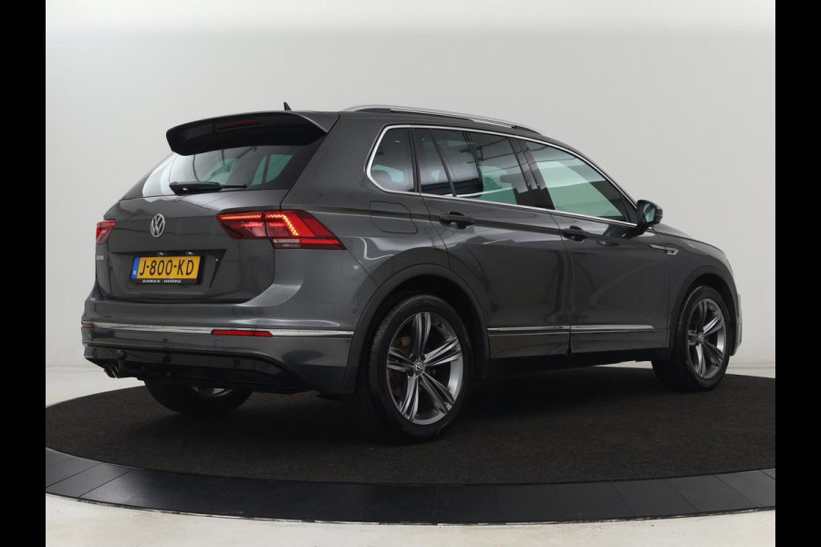 Volkswagen Tiguan 1.5 TSI R Line | Panoramadak | Trekhaak | Stoelverwarming | Camera | Adaptive cruise | Virtual Cockpit | 19'' | Carplay | Park Assist | Navigatie | Full LED Volkswagen Tiguan 1.5 TSI R Line | Panoramadak | Trekhaak | Stoelverwarming | Camera | Adaptive cruise | Virtual Cockpit | 19'' | Carplay | Park Assist | Navigatie | Full LED