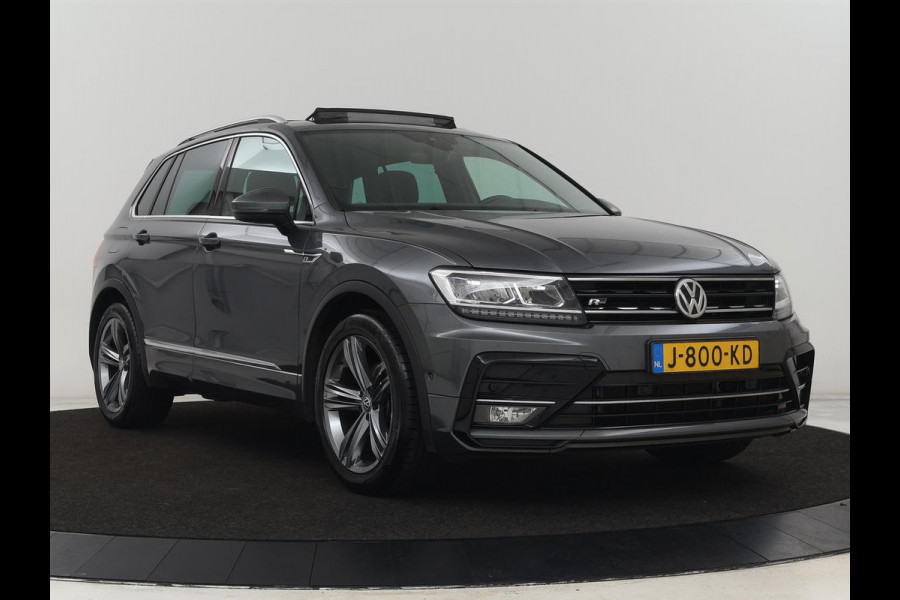 Volkswagen Tiguan 1.5 TSI R Line | Panoramadak | Trekhaak | Stoelverwarming | Camera | Adaptive cruise | Virtual Cockpit | 19'' | Carplay | Park Assist | Navigatie | Full LED Volkswagen Tiguan 1.5 TSI R Line | Panoramadak | Trekhaak | Stoelverwarming | Camera | Adaptive cruise | Virtual Cockpit | 19'' | Carplay | Park Assist | Navigatie | Full LED