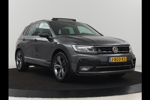 Volkswagen Tiguan 1.5 TSI R Line | Panoramadak | Trekhaak | Stoelverwarming | Camera | Adaptive cruise | Virtual Cockpit | 19'' | Carplay | Park Assist | Navigatie | Full LED Volkswagen Tiguan 1.5 TSI R Line | Panoramadak | Trekhaak | Stoelverwarming | Camera | Adaptive cruise | Virtual Cockpit | 19'' | Carplay | Park Assist | Navigatie | Full LED