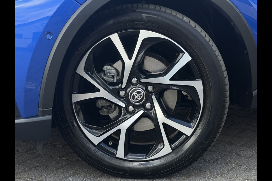 Toyota C-HR 2.0 Hybrid Bi-Tone | Navi | Carplay | Dodehoek | Park Assist | Camera Toyota C-HR 2.0 Hybrid Bi-Tone | Navi | Carplay | Dodehoek | Park Assist | Camera