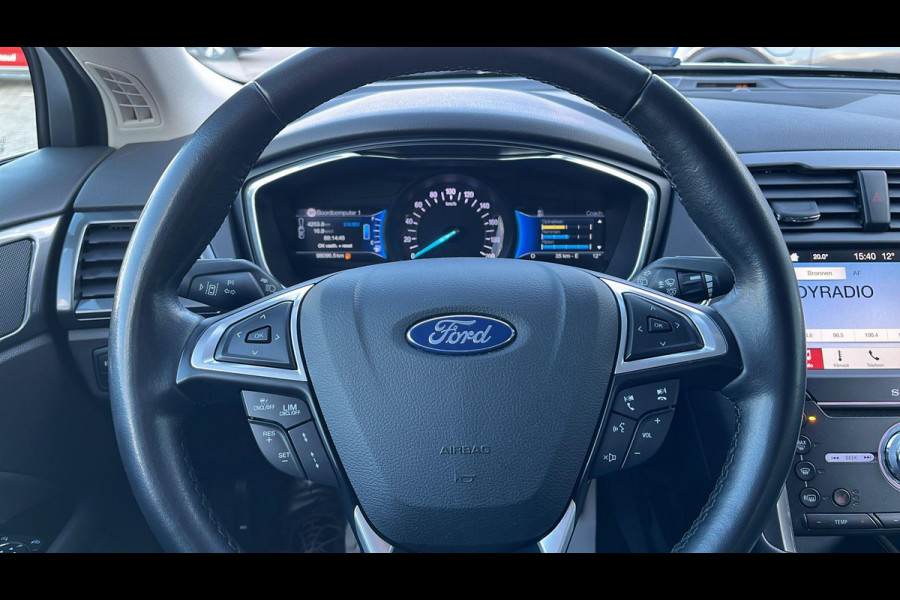 Ford Mondeo Wagon 2.0 IVCT HEV Titanium | Adaptieve cruise control | Trekhaak | Winter pack | Full LED | Vol leder Ford Mondeo Wagon 2.0 IVCT HEV Titanium | Adaptieve cruise control | Trekhaak | Winter pack | Full LED | Vol leder