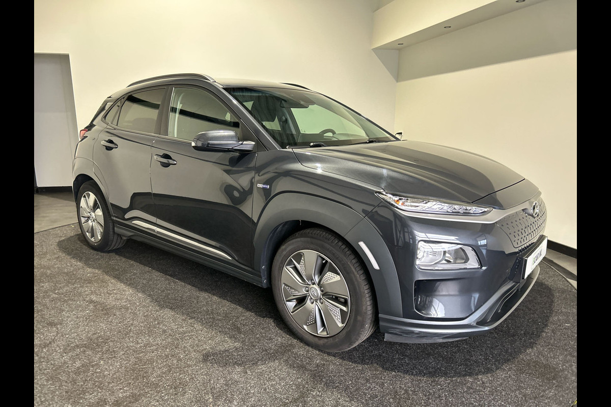 Hyundai Kona EV Fashion 64 kWh | Trekhaak | 1ste eigenaar | dealeronderhouden | Warmtepomp Hyundai Kona EV Fashion 64 kWh | Trekhaak | 1ste eigenaar | dealeronderhouden | Warmtepomp