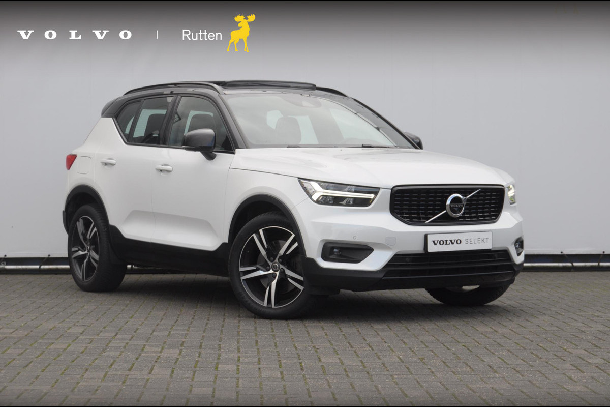 Volvo XC40 T5 262PK Automaat Recharge R-Design / BLIS / Stoel - en stuurwielverwarming / Leder met alcantara interieur / Parkeersensoren met 360 camera / Keyless entry / Elektrische stoelen met geheugen / Panoramadak / Harman kardon Volvo XC40 T5 262PK Automaat Recharge R-Design / BLIS / Stoel - en stuurwielverwarming / Leder met alcantara interieur / Parkeersensoren met 360 camera / Keyless entry / Elektrische stoelen met geheugen / Panoramadak / Harman kardon