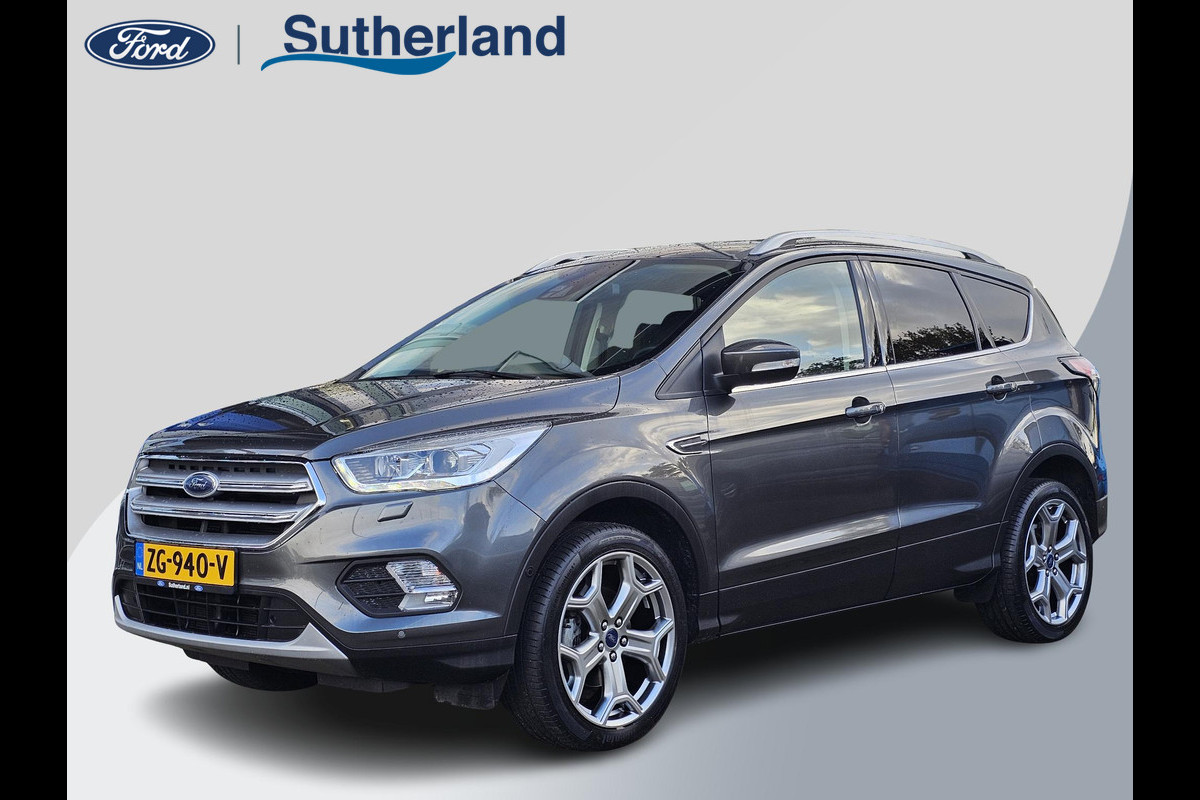 Ford Kuga 1.5 EcoBoost Titanium 150 pk | Nieuwstaat | Navigatie | PDC voor + achter | Keyless entry | Elektrisch bedienbare achterklep | Winterpack | Bi-xenon etc. Ford Kuga 1.5 EcoBoost Titanium 150 pk | Nieuwstaat | Navigatie | PDC voor + achter | Keyless entry | Elektrisch bedienbare achterklep | Winterpack | Bi-xenon etc.
