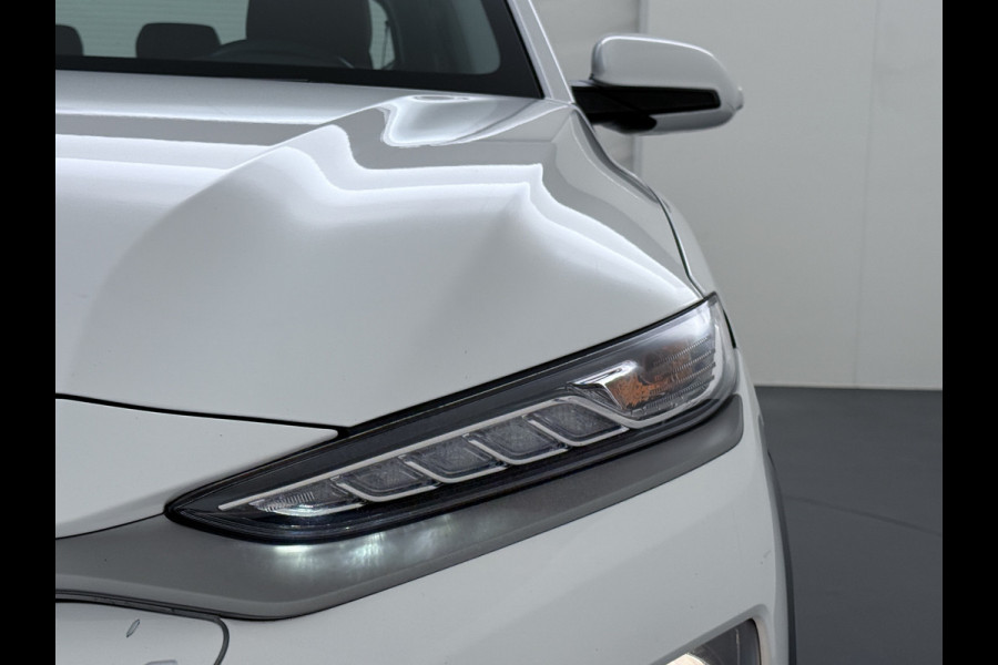 Hyundai Kona EV 64kWh Leder Warmtepomp Camera Adap. Cruise + stop&go Apple Carplay Android Comfort Ecc Pdc Navi* Isofix DAB Led Lmv 17" Lane Assist FCA Keyless 1e Eigenaar Origineel Nederlandse Auto Hyundai Kona EV 64kWh Leder Warmtepomp Camera Adap. Cruise + stop&go Apple Carplay Android Comfort Ecc Pdc Navi* Isofix DAB Led Lmv 17" Lane Assist FCA Keyless 1e Eigenaar Origineel Nederlandse Auto