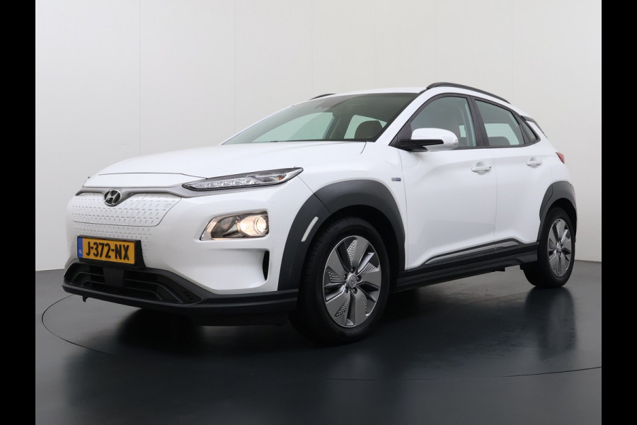 Hyundai Kona EV 64kWh Leder Warmtepomp Camera Adap. Cruise + stop&go Apple Carplay Android Comfort Ecc Pdc Navi* Isofix DAB Led Lmv 17" Lane Assist FCA Keyless 1e Eigenaar Origineel Nederlandse Auto Hyundai Kona EV 64kWh Leder Warmtepomp Camera Adap. Cruise + stop&go Apple Carplay Android Comfort Ecc Pdc Navi* Isofix DAB Led Lmv 17" Lane Assist FCA Keyless 1e Eigenaar Origineel Nederlandse Auto