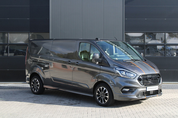 Ford Transit Custom 320 2.0 TDCI L2H1 Sport 185pk - ACC - Trekhaak - Navi - Camera - Stoelverwarming - Blind spot - Xenon - Rijklaar Ford Transit Custom 320 2.0 TDCI L2H1 Sport 185pk - ACC - Trekhaak - Navi - Camera - Stoelverwarming - Blind spot - Xenon - Rijklaar