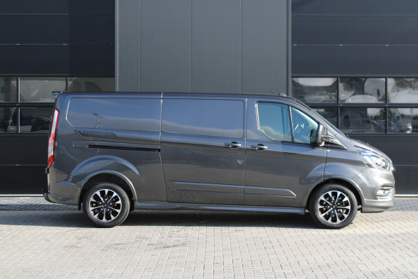 Ford Transit Custom 320 2.0 TDCI L2H1 Sport 185pk - ACC - Trekhaak - Navi - Camera - Stoelverwarming - Blind spot - Xenon - Rijklaar Ford Transit Custom 320 2.0 TDCI L2H1 Sport 185pk - ACC - Trekhaak - Navi - Camera - Stoelverwarming - Blind spot - Xenon - Rijklaar