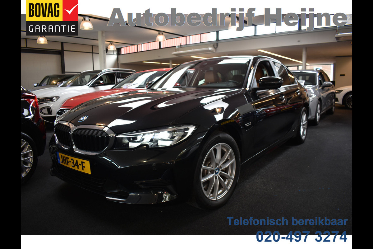 BMW 3-serie 320e 204PK HYBRID BUSINESS LEDER/CAMERA/TREKHAAK