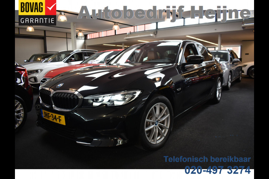BMW 3-serie 320e 204PK HYBRID BUSINESS LEDER/CAMERA/TREKHAAK