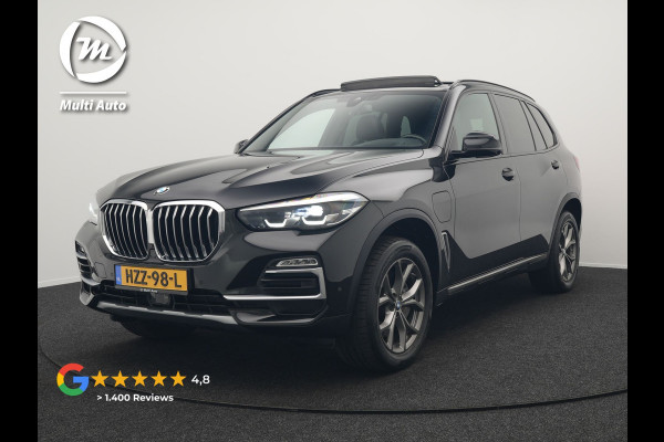 BMW X5 xDrive45e High Executive Plug In Hybrid 395pk Dealer O.H PHEV | Trekhaak Af Fabriek | Luchtvering | Panodak | Head Up | Adaptive Cruise | 360 Camera | Adaptief Onderstel | Lederen Sportstoelen Memory & Verwarmd | Apple Carplay | Sfee BMW X5 xDrive45e High Executive Plug In Hybrid 395pk Dealer O.H PHEV | Trekhaak Af Fabriek | Luchtvering | Panodak | Head Up | Adaptive Cruise | 360 Camera | Adaptief Onderstel | Lederen Sportstoelen Memory & Verwarmd | Apple Carplay | Sfee