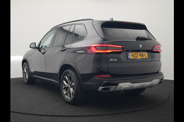 BMW X5 xDrive45e High Executive Plug In Hybrid 395pk Dealer O.H PHEV | Trekhaak Af Fabriek | Luchtvering | Panodak | Head Up | Adaptive Cruise | 360 Camera | Adaptief Onderstel | Lederen Sportstoelen Memory & Verwarmd | Apple Carplay | Sfee BMW X5 xDrive45e High Executive Plug In Hybrid 395pk Dealer O.H PHEV | Trekhaak Af Fabriek | Luchtvering | Panodak | Head Up | Adaptive Cruise | 360 Camera | Adaptief Onderstel | Lederen Sportstoelen Memory & Verwarmd | Apple Carplay | Sfee