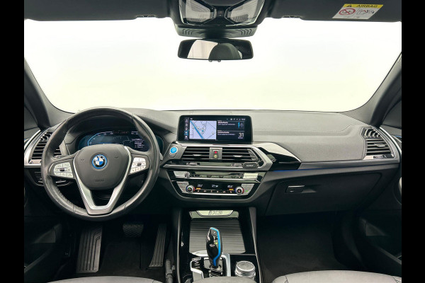 BMW iX3 Executive 80 kWh * SOH 98% * Pano/dak Trekhaak Camera Origineel NL
