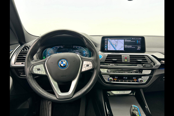 BMW iX3 Executive 80 kWh * SOH 98% * Pano/dak Trekhaak Camera Origineel NL