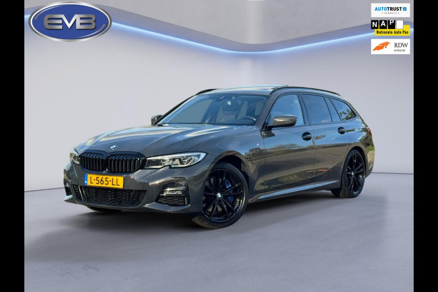 BMW 3 Serie Touring 330e M sport individual, dravitgrau, panodak,laser led, elec bedienbare trekhaak, vol opties, nl auto met nap