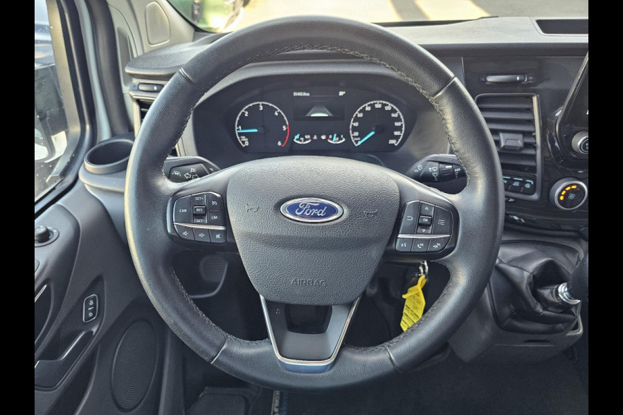 Ford Transit Custom 300 2.0 TDCI L2H1 Trail | Glasslook panelen | Raptor grille | Camera | Trekhaak | Leder | Voorruitverwarming | Airco | Cruise control etc.