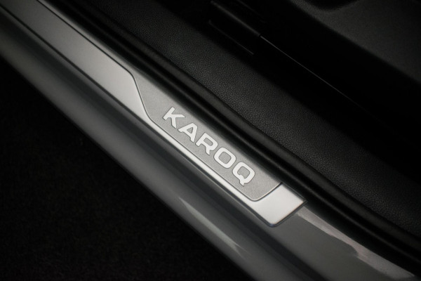 Škoda Karoq 1.0 TSI Ambition Sport [ Panoramadak El Trekhaak Camera Sportinterieur Stoelverwarming Carplay ]