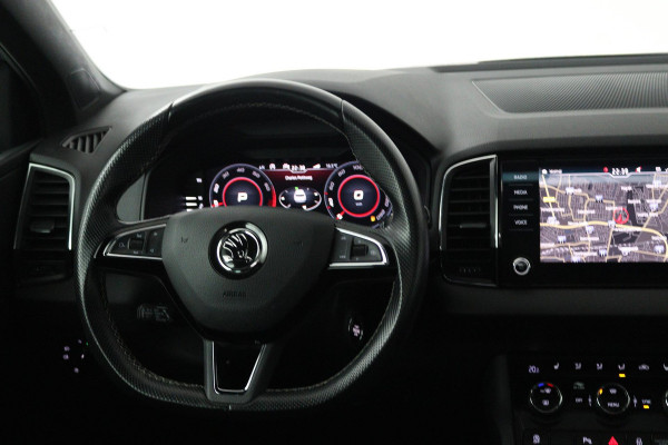 Škoda Karoq 1.5 TSI ACT Sportline Business (PANORAMADAK, DIGITALE COCKPIT, ACHTERUITRIJCAMERA, STOELVERWARMING, CRUISE ADAPTIEF)