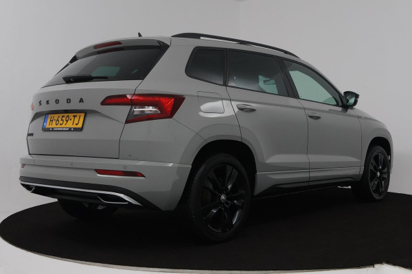 Škoda Karoq 1.5 TSI ACT Sportline Business (PANORAMADAK, DIGITALE COCKPIT, ACHTERUITRIJCAMERA, STOELVERWARMING, CRUISE ADAPTIEF)