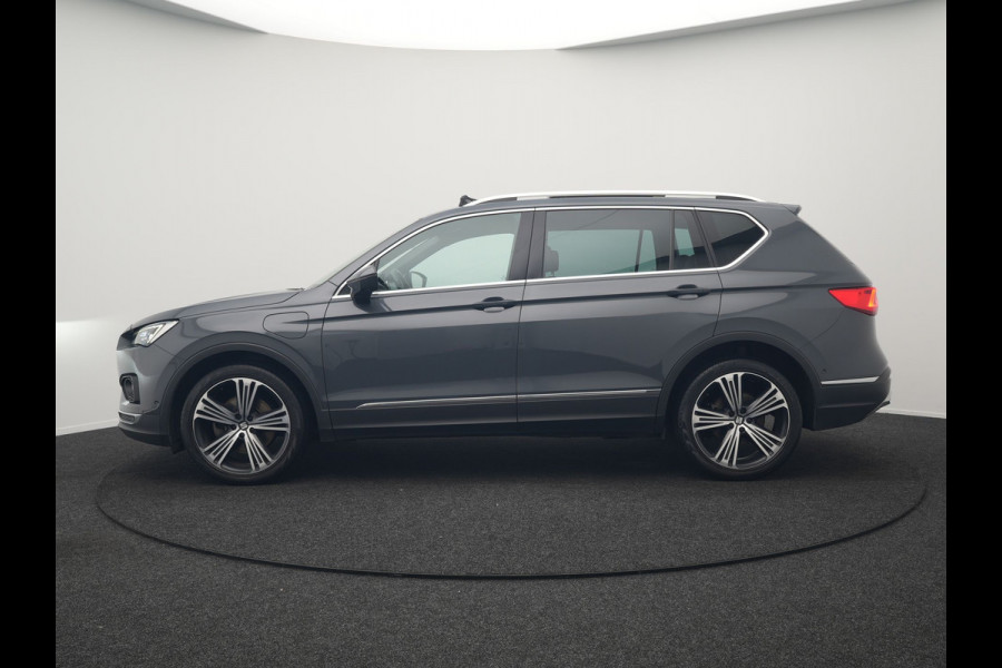 Seat Tarraco 1.4 TSI e-Hybrid Xcellence Plug In Hybrid 245pk Dealer O.H PHEV | Trekhaak Af Fabriek | Panodak | Adaptive Cruise | 360 Camera | Lederen Sportstoelen Memory & Verwarmd | Apple Carplay | Virtual | Stuur Verwarmd | Blis | Navigatie | DAB | 20"L.M |