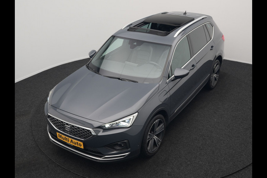 Seat Tarraco 1.4 TSI e-Hybrid Xcellence Plug In Hybrid 245pk Dealer O.H PHEV | Trekhaak Af Fabriek | Panodak | Adaptive Cruise | 360 Camera | Lederen Sportstoelen Memory & Verwarmd | Apple Carplay | Virtual | Stuur Verwarmd | Blis | Navigatie | DAB | 20"L.M |