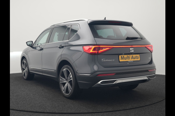 Seat Tarraco 1.4 TSI e-Hybrid Xcellence Plug In Hybrid 245pk Dealer O.H PHEV | Trekhaak Af Fabriek | Panodak | Adaptive Cruise | 360 Camera | Lederen Sportstoelen Memory & Verwarmd | Apple Carplay | Virtual | Stuur Verwarmd | Blis | Navigatie | DAB | 20"L.M |