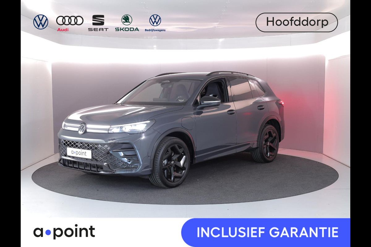 Volkswagen Tiguan 1.5 eHybrid R-Line Edition 272 pk Automaat (DSG) | Verlengde garantie | Navigatie | Parkeersensoren (Park assist) | Rondomzicht camera | Stoelverwarming v/a | Black Style pakket | R-Line |