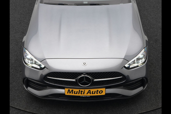 Mercedes-Benz C-Klasse Estate 300 e AMG Night Plug In Hybrid 320pk Dealer O.H. NIEUW MODEL PHEV | Panodak | Trekhaak af Fabriek | Alcantara Sportstoelen Verwarmd | Sfeerverlichting | Navigatie | Apple Carplay | Virtual | Camera | DAB |