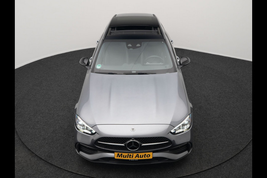Mercedes-Benz C-Klasse Estate 300 e AMG Night Plug In Hybrid 320pk Dealer O.H. NIEUW MODEL PHEV | Panodak | Trekhaak af Fabriek | Alcantara Sportstoelen Verwarmd | Sfeerverlichting | Navigatie | Apple Carplay | Virtual | Camera | DAB |