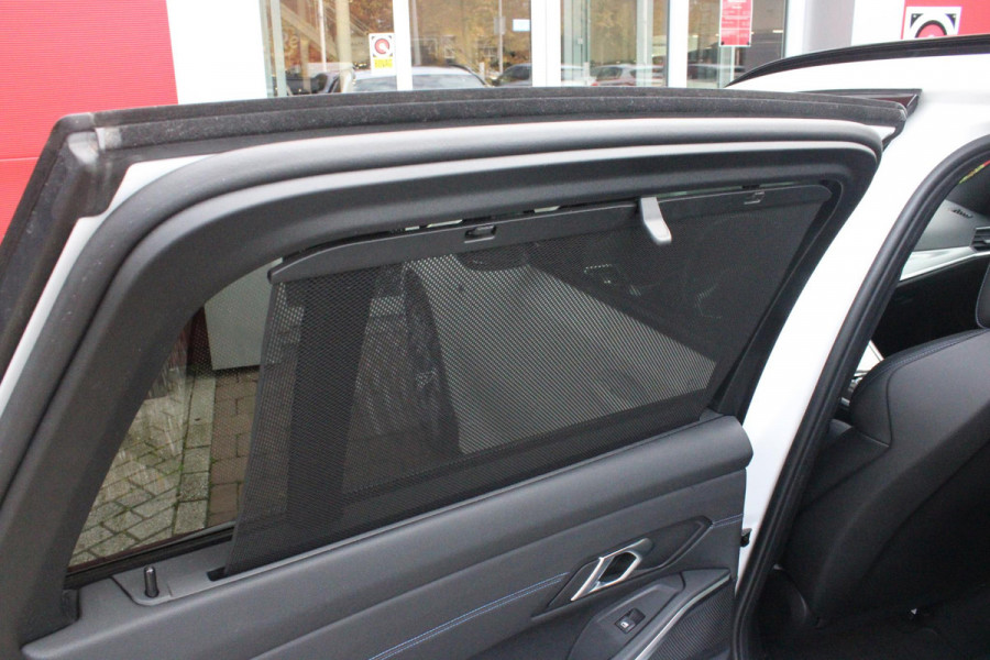 BMW 3 Serie Touring 330e 292PK M-SPORT | M-SPORT PRO-PAKKET | M-SPORT REMMEN UITGEVOERD IN DONKERBLAUW MET M LOGO | BMW LIVE COCKPIT PROFESSIONAL | CURVED DISPLAY |DRIVING ASSISTANT INCL. HEAD-UP DISPLAY | PANORAMISCH SCHUIF/KANTEL DAK | PARKING ASSIST INCL. ACHTERUITRIJCAMERA | ADAPTIEVE LED KOPLAMPEN |SHADOW LINE | M-SPORTSTOELEN VOOR | LEDER VERNASCA MET CONTRAST STIKSELS M-SPORT | STOEL VERWARMING | DRAADLOZE APPLE CARPLAY | ELEKTRISCH VERSTELBARE STOELEN MET GEHEUGEN FUNCTIE | HEAD UP DISPLAY | DRAADLOZE TELEFOONLADER | DODEHOEK BEWAKING | COMFORT PACK INCL. ELEKTRISCHE ACHTE