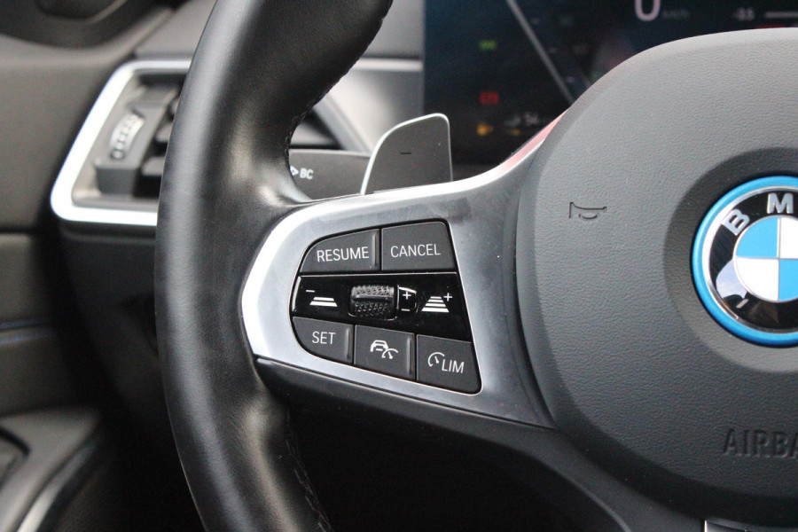 BMW 3 Serie Touring 330e 292PK M-SPORT | M-SPORT PRO-PAKKET | M-SPORT REMMEN UITGEVOERD IN DONKERBLAUW MET M LOGO | BMW LIVE COCKPIT PROFESSIONAL | CURVED DISPLAY |DRIVING ASSISTANT INCL. HEAD-UP DISPLAY | PANORAMISCH SCHUIF/KANTEL DAK | PARKING ASSIST INCL. ACHTERUITRIJCAMERA | ADAPTIEVE LED KOPLAMPEN |SHADOW LINE | M-SPORTSTOELEN VOOR | LEDER VERNASCA MET CONTRAST STIKSELS M-SPORT | STOEL VERWARMING | DRAADLOZE APPLE CARPLAY | ELEKTRISCH VERSTELBARE STOELEN MET GEHEUGEN FUNCTIE | HEAD UP DISPLAY | DRAADLOZE TELEFOONLADER | DODEHOEK BEWAKING | COMFORT PACK INCL. ELEKTRISCHE ACHTE