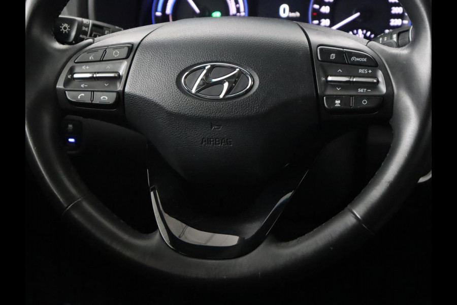 Hyundai Kona 1.6 GDI HEV Fashion Sky | Schuifdak | Adaptive cruise | Carplay | Camera | Head-Up | Keyless | Navigatie | Climate control | Bluetooth