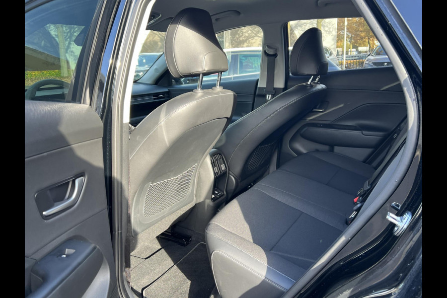 Hyundai Kona Elektro 160 kW Trend-Paket 65,4kWh 3-Fase Lader | Dealeronderhouden | Fabrieksgarantie Hyundai tot 2029 | Elektrische Achterklep | Stoel & Stuurverwarming | Afnembare Trekhaak | Rijklaar Geleverd
