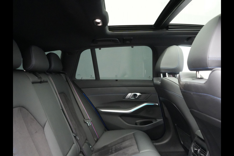 BMW 3 Serie Touring 330e M Sport Pro Plug In Hybrid 292pk Dealer O.H. PHEV | Widescreen Navi | Trekhaak Af Fabriek | Panodak | Adaptive Cruise | Camera |  Alcantara Sportstoelen Memory & Verwarmd | Sfeerverlichting | Apple Carplay | Stuur Verwarmd | Navigatie |