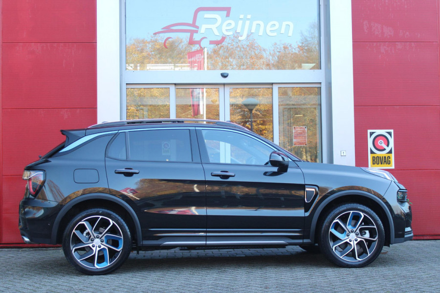 Lynk & Co 01 1.5 261PK PHEV | PANORAMA SCHUIF / KANTELDAK | INFINTY AUDIO | DODEHOEK DETECTIE | NAVIGATIE | DASHBOARD CAMERA | ELEKTRISCHE STOELVERSTELLING MET GEHEUGEN FUNCTIE | DAB+ RADIO | DRAADLOZE APPLE CARPLAY/ANDROID AUTO | DRAADLOZE TELEFOONLADER | ELEKTRISCH BEDIENBARE ACHTERKLEP | STOEL VERWARMING | 360° CAMERA | DODEHOEK DETECTIE | ZWARTE HEMEL BEKLEDING | KEYLESS ENTRY/START | 20" LICHTMETALEN VELGEN |