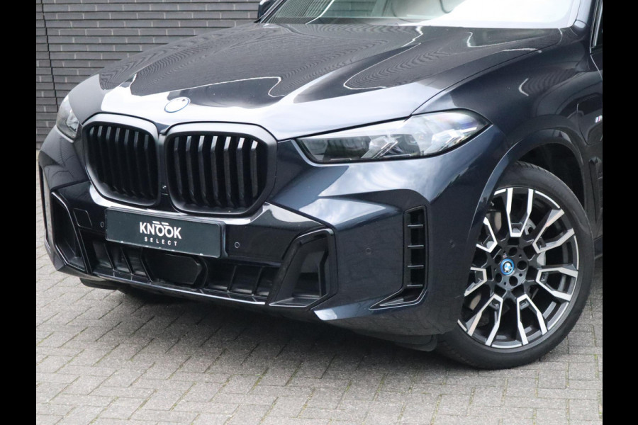 BMW X5 xDrive50e High Executive M Sport Pakket Automaat / Live Cockpit Plus / Panoramadak / Trekhaak / Luchtvering / Harman Kardon / Comfortstoelen / Warmtecomfortpakket / Sfeerverlichting / Active Protection / Shadow Line / 21 Inch