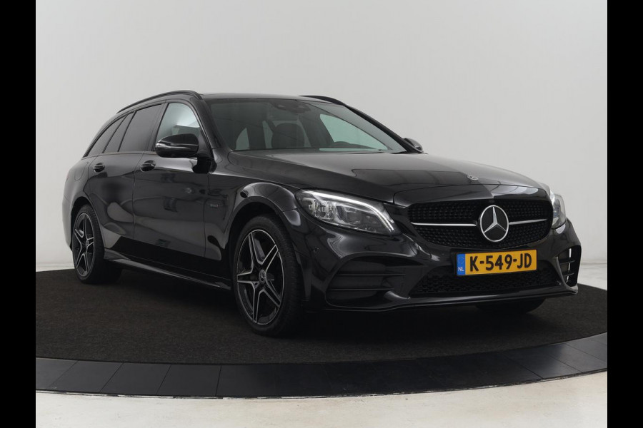Mercedes-Benz C-Klasse 300e AMG Limited | Panoramadak | 360 Camera | Stoelverwarming | Carplay | Matrix LED | Leder/Alcantara | Navigatie | Park Assist | Sfeerverlichting | PHEV | Plug In
