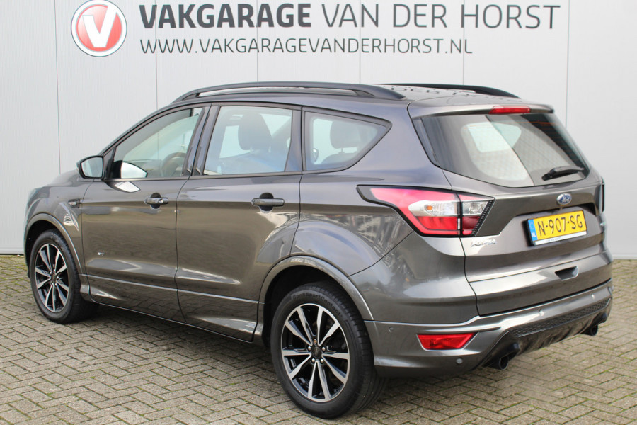 Ford Kuga 1.5-182pk EcoBoost ST-Line AWD-AUTOMAAT. Ideale caravantrekker: vierwielaangedreven automaat, trekgewicht 1.850kg ! Autm. airco dual, adapt. cruise cntrl, navigatie, telefoonvoorb., stoel- en voorraamverw., bi-xenon verl., lm wielen, camera, pdc v+a, Sony soundsyst., side- en laneassist etc.