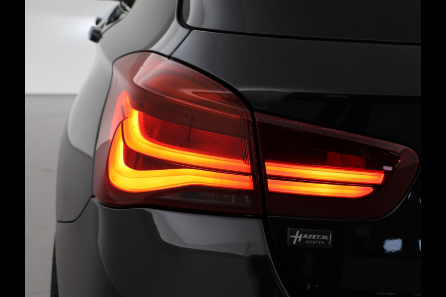 BMW 1-serie M140i 340 PK M-SPORT AUT8 + HARMAN/KARDON | 19 INCH | SPORTUITLAAT | CAMERA | STOELVERWARMING