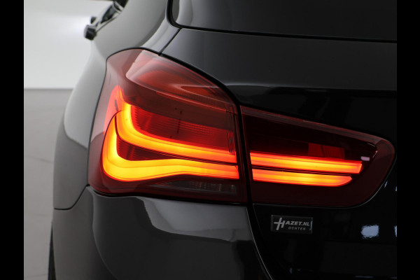BMW 1-serie M140i 340 PK M-SPORT AUT8 + HARMAN/KARDON | 19 INCH | SPORTUITLAAT | CAMERA | STOELVERWARMING