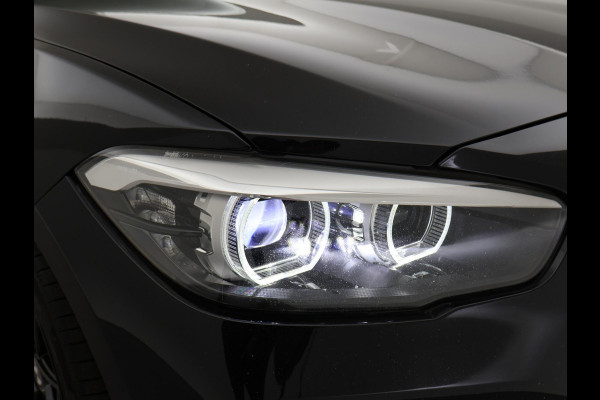 BMW 1-serie M140i 340 PK M-SPORT AUT8 + HARMAN/KARDON | 19 INCH | SPORTUITLAAT | CAMERA | STOELVERWARMING